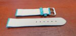 rear of turquoise strap